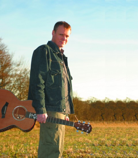Jim Malcolm with guitar